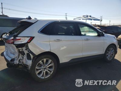 Trzecie zdjęcie samochodu z tyłu: 2020 FORD EDGE TITANIUM VIN:2FMPK4K91LBA83447 - miniatura