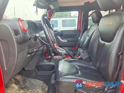 Zdjęcie 7 z 13 samochodu: 2014 JEEP WRANGLER UNLIMITED SAHARA VIN:1C4BJWEG0EL128355 - miniatura