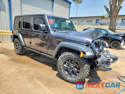 Czwarte zdjęcie samochodu z boku: 2023 JEEP WRANGLER SPORT VIN:1C4HJXDG7PW545717 - miniatura