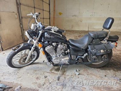 Trzecie zdjęcie samochodu z tyłu: 2004 HONDA VT600 CD VIN:JH2PC21354M503796 - miniatura