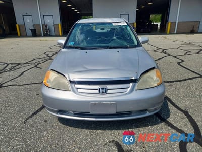 Piąte zdjęcie samochodu w środku: 2001 HONDA CIVIC LX VIN:1HGES16571L023690 - miniatura