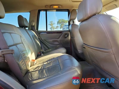 Zdjęcie 10 z 12 samochodu: 2002 JEEP GRAND CHEROKEE LIMITED VIN:1J8GW58NX2C257879 - miniatura