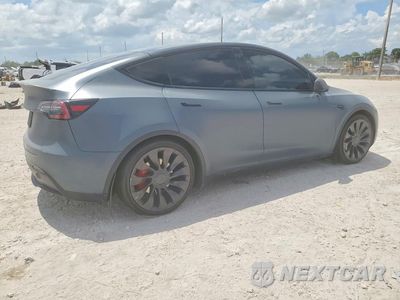 Trzecie zdjęcie samochodu z tyłu: 2022 TESLA MODEL Y VIN:7SAYGDEF8NF358297 - miniatura
