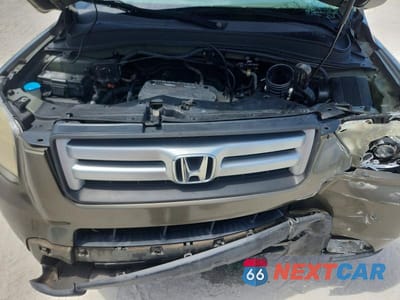 Zdjęcie 12 z 13 samochodu: 2007 HONDA PILOT EXL VIN:5FNYF18577B033001 - miniatura