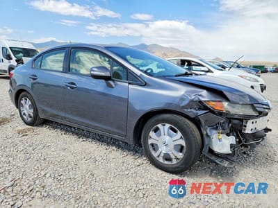 Czwarte zdjęcie samochodu z boku: 2012 HONDA CIVIC HYBRID VIN:JHMFB4F25CS009319 - miniatura