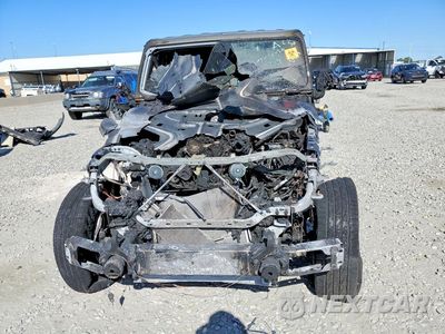 Piąte zdjęcie samochodu w środku: 2019 JEEP WRANGLER UNLIMITED SAHARA VIN:1C4HJXEN7KW500931 - miniatura