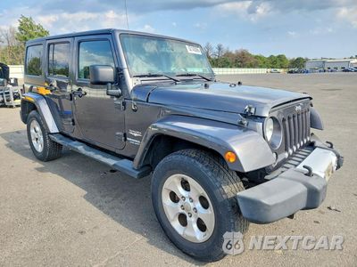 Czwarte zdjęcie samochodu z boku: 2014 JEEP WRANGLER UNLIMITED SAHARA VIN:1C4HJWEG9EL203631 - miniatura