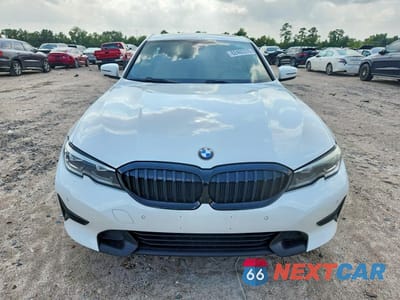 Piąte zdjęcie samochodu w środku: 2021 BMW 330I VIN:3MW5R1J06M8B82263 - miniatura