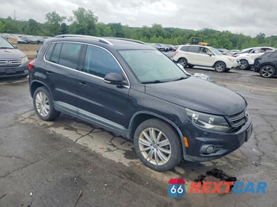 Czwarte zdjęcie samochodu z boku: 2015 VOLKSWAGEN TIGUAN S VIN:WVGAV7AX9FW538093 - miniatura
