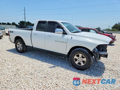 Czwarte zdjęcie samochodu z boku: 2012 DODGE RAM 1500 SLT VIN:1C6RD7GP5CS220693 - miniatura
