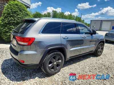 Trzecie zdjęcie samochodu z tyłu: 2012 JEEP GRAND CHEROKEE LAREDO VIN:1C4RJFAG8CC103463 - miniatura