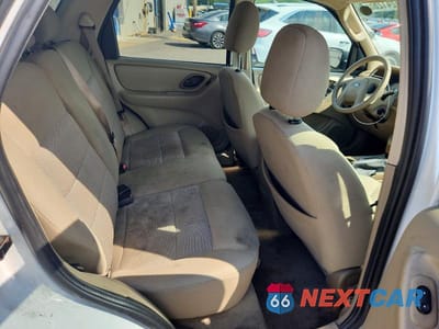 Zdjęcie 11 z 13 samochodu: 2006 FORD ESCAPE XLT VIN:1FMYU03146KB08965 - miniatura