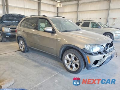 Czwarte zdjęcie samochodu z boku: 2011 BMW X5 XDRIVE35I VIN:5UXZV4C59BL403708 - miniatura