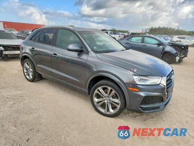 Czwarte zdjęcie samochodu z boku: 2018 AUDI Q3 PREMIUM VIN:WA1BCCFS0JR030987 - miniatura