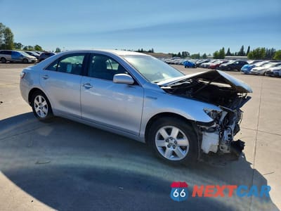 Czwarte zdjęcie samochodu z boku: 2010 TOYOTA CAMRY HYBRID VIN:4T1BB3EK4AU123272 - miniatura