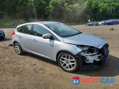 Czwarte zdjęcie samochodu z boku: 2015 FORD FOCUS SE VIN:1FADP3K22FL283818 - miniatura