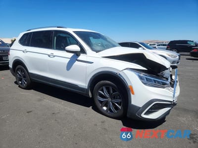 Czwarte zdjęcie samochodu z boku: 2022 VOLKSWAGEN TIGUAN SE VIN:3VV3B7AX9NM082845 - miniatura