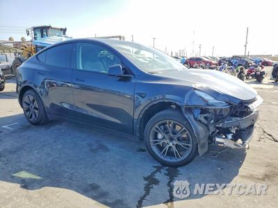 Czwarte zdjęcie samochodu z boku: 2024 TESLA MODEL Y VIN:7SAYGDED3RF102444 - miniatura
