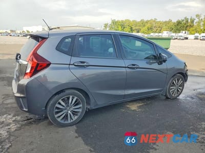 Trzecie zdjęcie samochodu z tyłu: 2015 HONDA FIT EX VIN:3HGGK5H80FM772182 - miniatura
