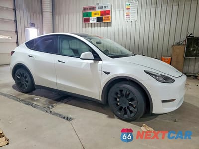 Czwarte zdjęcie samochodu z boku: 2022 TESLA MODEL Y VIN:7SAYGDEE3NF354472 - miniatura