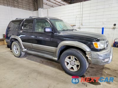 Czwarte zdjęcie samochodu z boku: 1999 TOYOTA 4RUNNER LIMITED VIN:JT3GN87R3X0134244 - miniatura