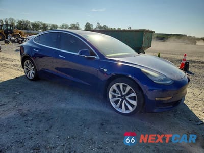 Czwarte zdjęcie samochodu z boku: 2018 TESLA MODEL 3 VIN:5YJ3E1EB1JF133867 - miniatura