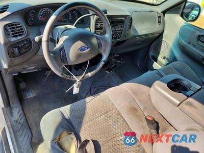 Zdjęcie 8 z 12 samochodu: 2003 FORD F150 VIN:1FTRX18L63NA87028 - miniatura