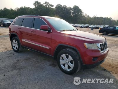 Czwarte zdjęcie samochodu z boku: 2013 JEEP GRAND CHEROKEE LAREDO VIN:1C4RJFAG0DC545154 - miniatura