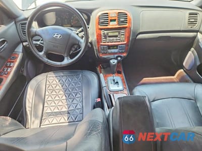 Zdjęcie 8 z 12 samochodu: 2003 HYUNDAI SONATA GLS VIN:KMHWF35H73A851893 - miniatura