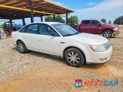 Czwarte zdjęcie samochodu z boku: 2009 FORD TAURUS SEL VIN:1FAHP24W19G105259 - miniatura
