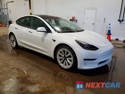Czwarte zdjęcie samochodu z boku: 2022 TESLA MODEL 3 VIN:5YJ3E1EA6NF371114 - miniatura