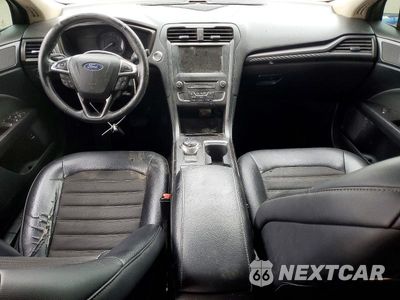 Zdjęcie 8 z 12 samochodu: 2018 FORD FUSION SE HYBRID VIN:3FA6P0LU0JR240810 - miniatura