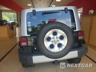 Zdjęcie 6 z 13 samochodu: 2015 JEEP WRANGLER UNLIMITED SAHARA VIN:1C4BJWEG6FL690620 - miniatura