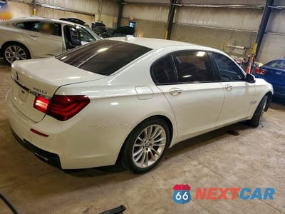 Trzecie zdjęcie samochodu z tyłu: 2014 BMW 750 LI VIN:WBAYE8C56ED780500 - miniatura