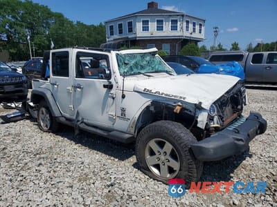 Czwarte zdjęcie samochodu z boku: 2010 JEEP WRANGLER UNLIMITED SPORT VIN:1J4BA3H11AL159396 - miniatura