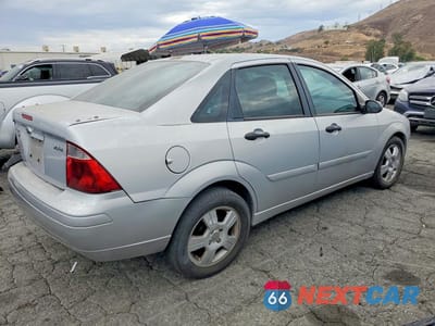 Trzecie zdjęcie samochodu z tyłu: 2006 FORD FOCUS ZX4 VIN:1FAFP34N86W137650 - miniatura