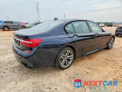 Trzecie zdjęcie samochodu z tyłu: 2019 BMW 750 I VIN:WBA7F0C58KGM24523 - miniatura