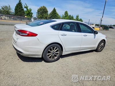 Trzecie zdjęcie samochodu z tyłu: 2017 FORD FUSION SE VIN:3FA6P0HD9HR186328 - miniatura