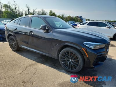 Czwarte zdjęcie samochodu z boku: 2023 BMW X6 XDRIVE40I VIN:5UXCY6C02P9R83286 - miniatura
