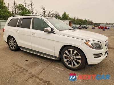 Czwarte zdjęcie samochodu z boku: 2015 MERCEDES-BENZ GL 450 4MATIC VIN:4JGDF6EE2FA462078 - miniatura
