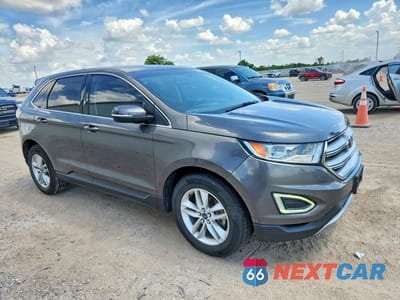 Czwarte zdjęcie samochodu z boku: 2015 FORD EDGE SEL VIN:2FMTK3J91FBC17310 - miniatura