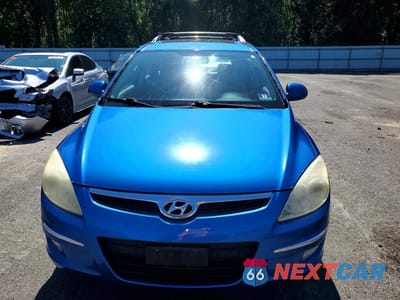 Piąte zdjęcie samochodu w środku: 2012 HYUNDAI ELANTRA TOURING SE VIN:KMHDC8AE4CU128333 - miniatura