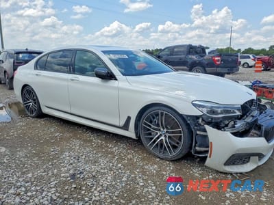 Czwarte zdjęcie samochodu z boku: 2018 BMW 750 XI VIN:WBA7F2C5XJG424324 - miniatura