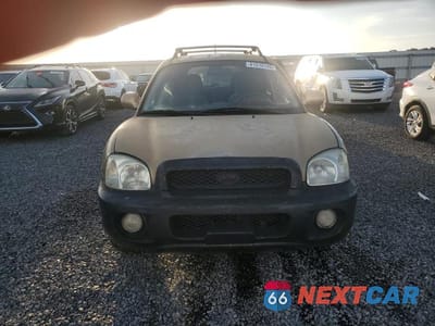 Piąte zdjęcie samochodu w środku: 2004 HYUNDAI SANTA FE GLS VIN:KM8SC13D44U842807 - miniatura