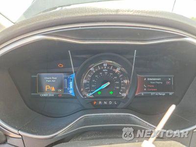 Zdjęcie 9 z 12 samochodu: 2015 FORD FUSION SE PHEV VIN:3FA6P0PU8FR291392 - miniatura