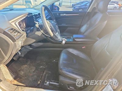 Zdjęcie 7 z 12 samochodu: 2019 FORD FUSION TITANIUM VIN:3FA6P0RU1KR185650 - miniatura