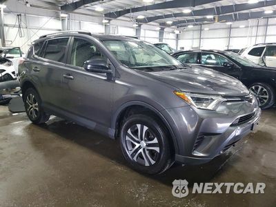Czwarte zdjęcie samochodu z boku: 2017 TOYOTA RAV4 LE VIN:JTMBFREV6HJ701874 - miniatura