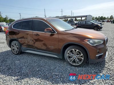Czwarte zdjęcie samochodu z boku: 2016 BMW X1 XDRIVE28I VIN:WBXHT3C36GP885519 - miniatura