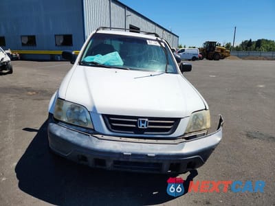 Piąte zdjęcie samochodu w środku: 2001 HONDA CR-V LX VIN:JHLRD18491C042565 - miniatura