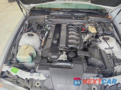 Zdjęcie 11 z 12 samochodu: 1998 BMW 323 IC AUTOMATIC VIN:WBABJ8322WEM21728 - miniatura